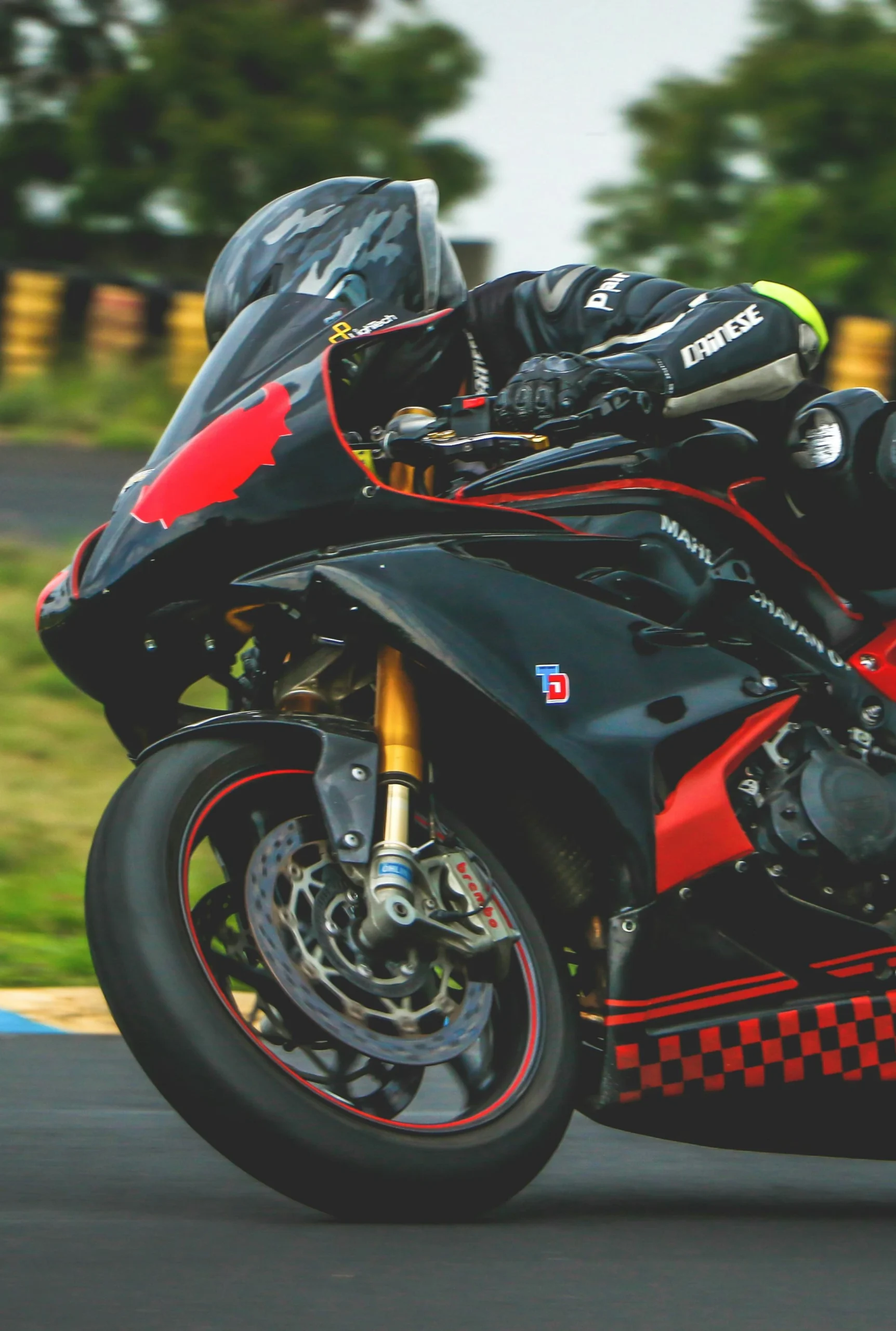 Man riding bike on race track